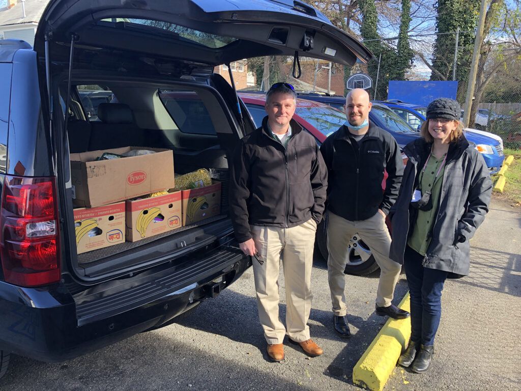 Hughes Employees Delivering Food